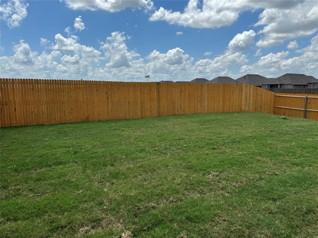 1729 High Perch Lane Forney, TX 75126 - Photo 15 of 16 View of fenced backyard