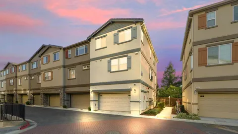 a front view of a multi story residential apartment building