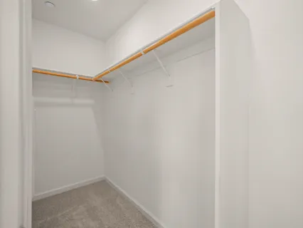 a small space with a window and a shower