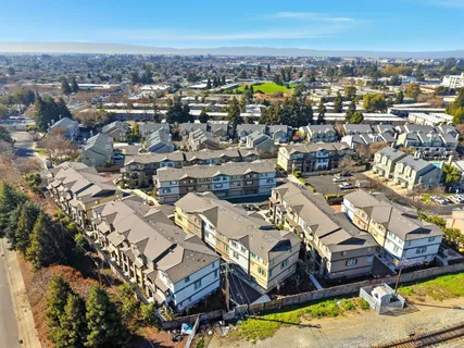 an aerial view of a city with lots of residential buildings
