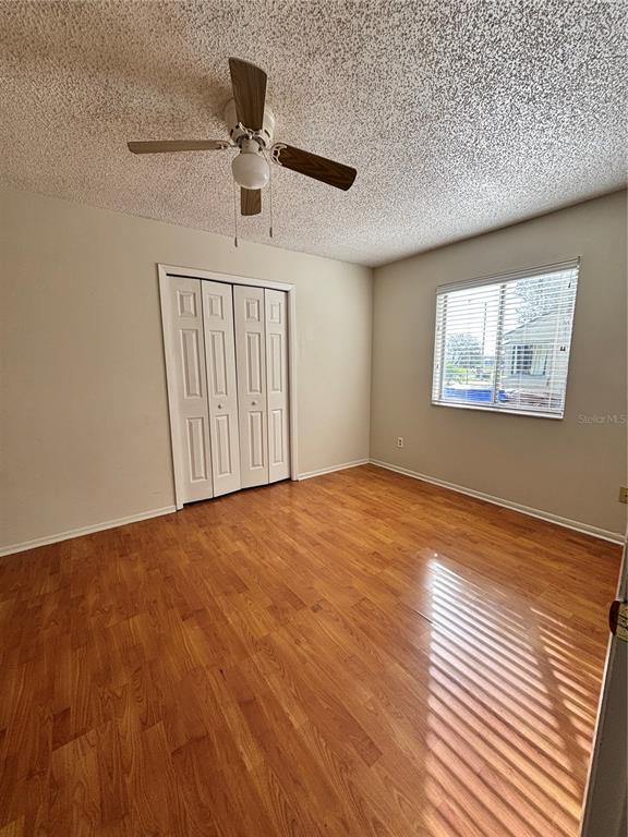 2346 St Croix Street Kissimmee, FL 34741 - Photo 10 of 12 a view of empty room with wooden floor