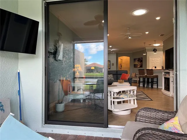 a view of a lake with houses in the back