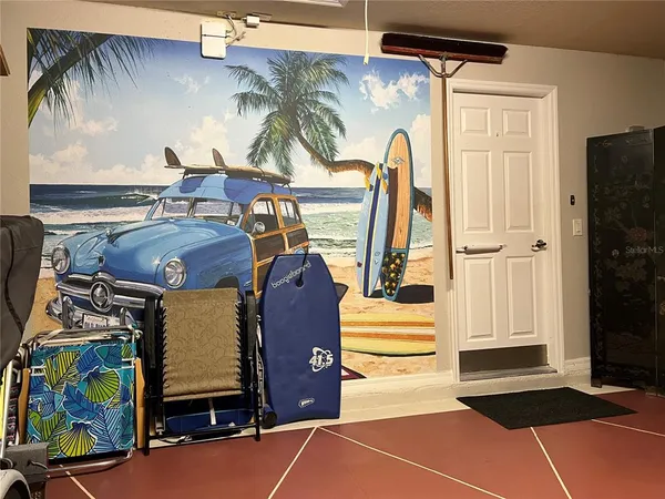 a view of a garage with chairs