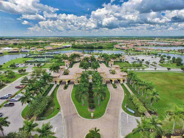 a view of a golf course with a houses
