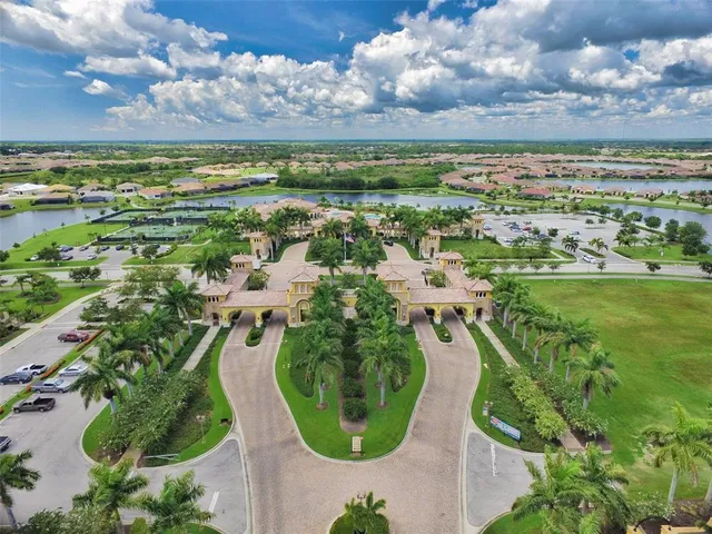 a view of a golf course with a houses