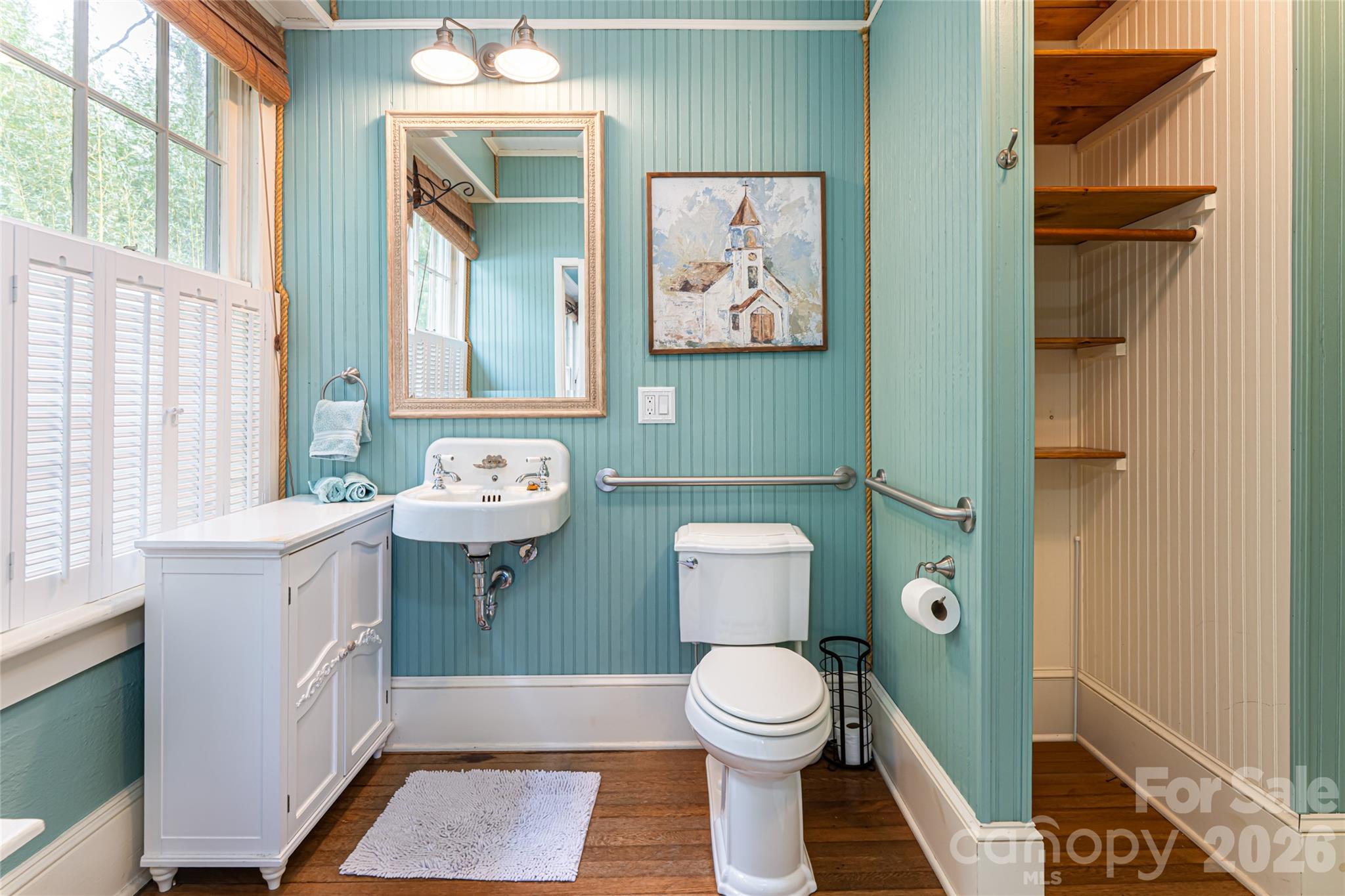 147 Preservation Way Waynesville, NC 28786 - Photo 11 of 48 a bathroom with a toilet a sink and a window
