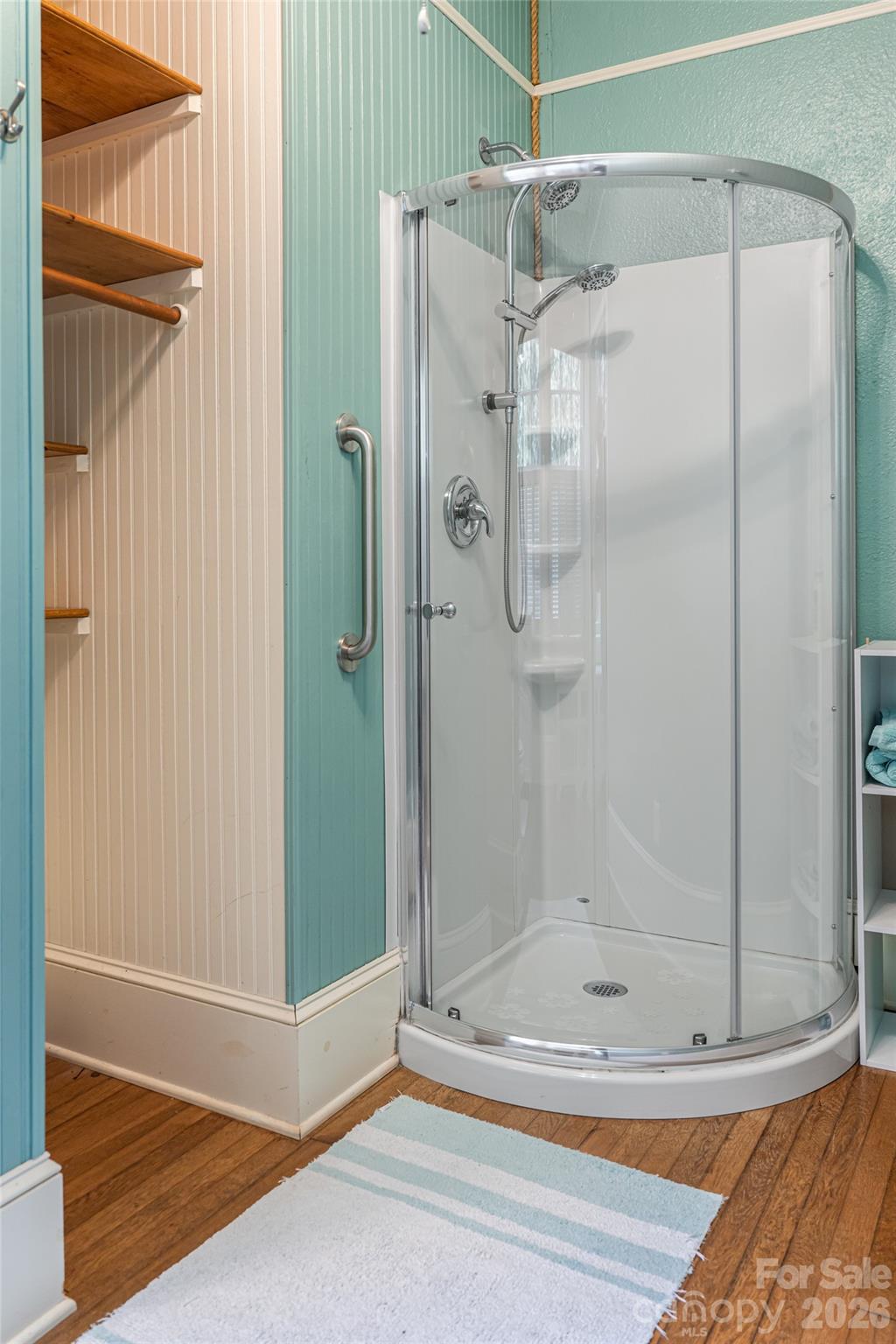 147 Preservation Way Waynesville, NC 28786 - Photo 13 of 48 a bathroom with a glass shower door