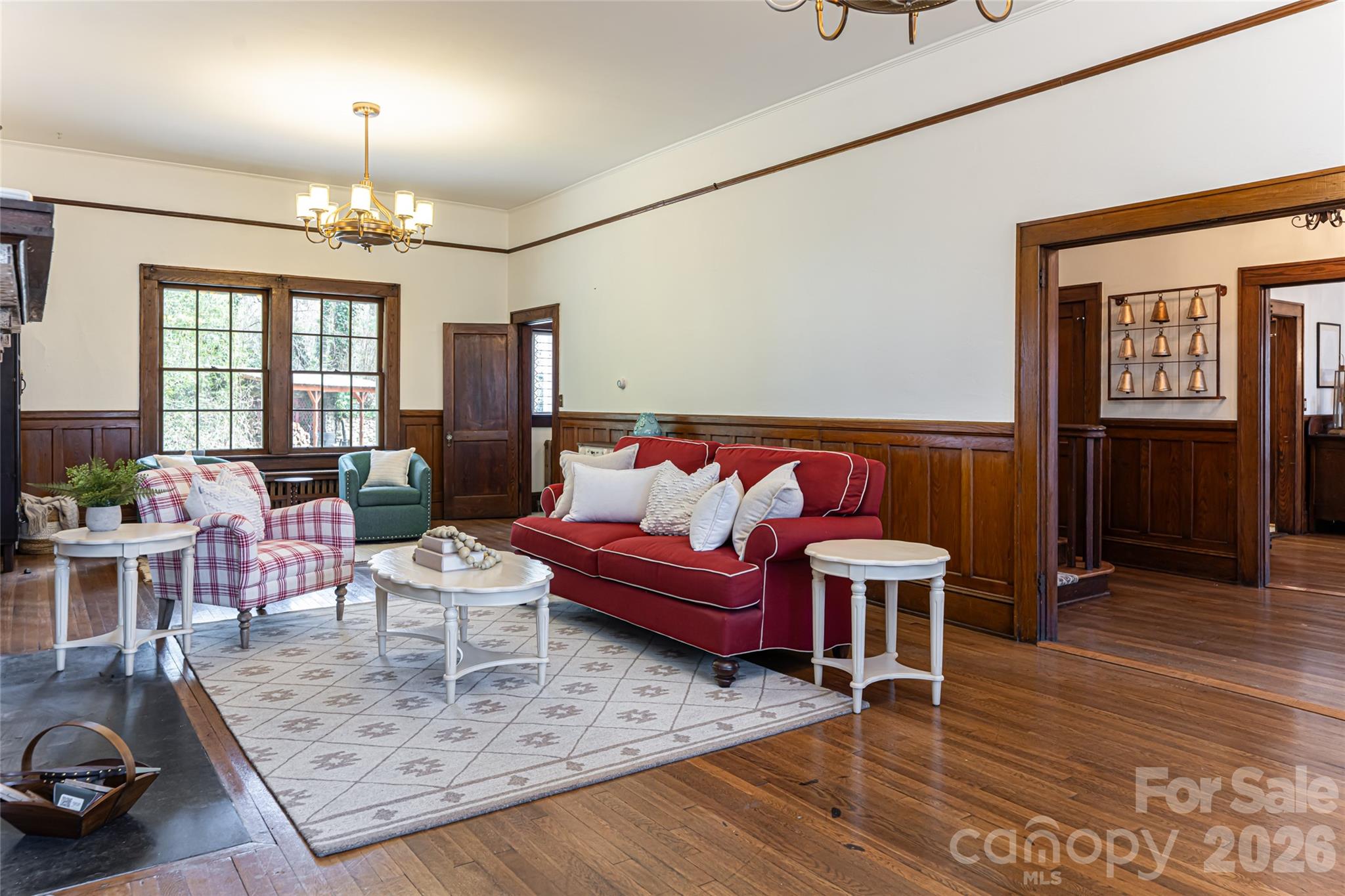 147 Preservation Way Waynesville, NC 28786 - Photo 21 of 48 a living room with furniture and a wooden floor