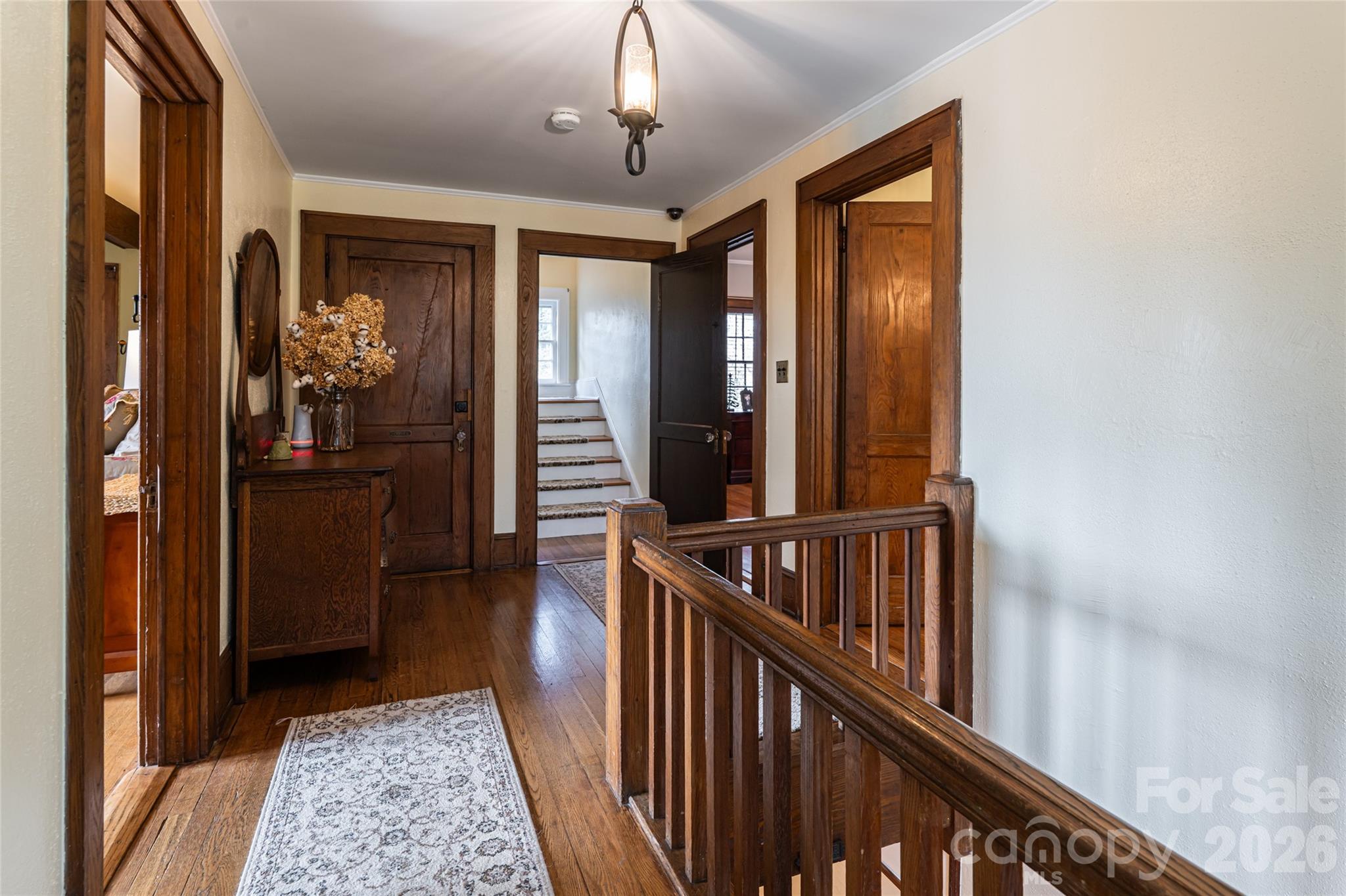 147 Preservation Way Waynesville, NC 28786 - Photo 27 of 48 a view of a hallway view with wooden floor and staircase