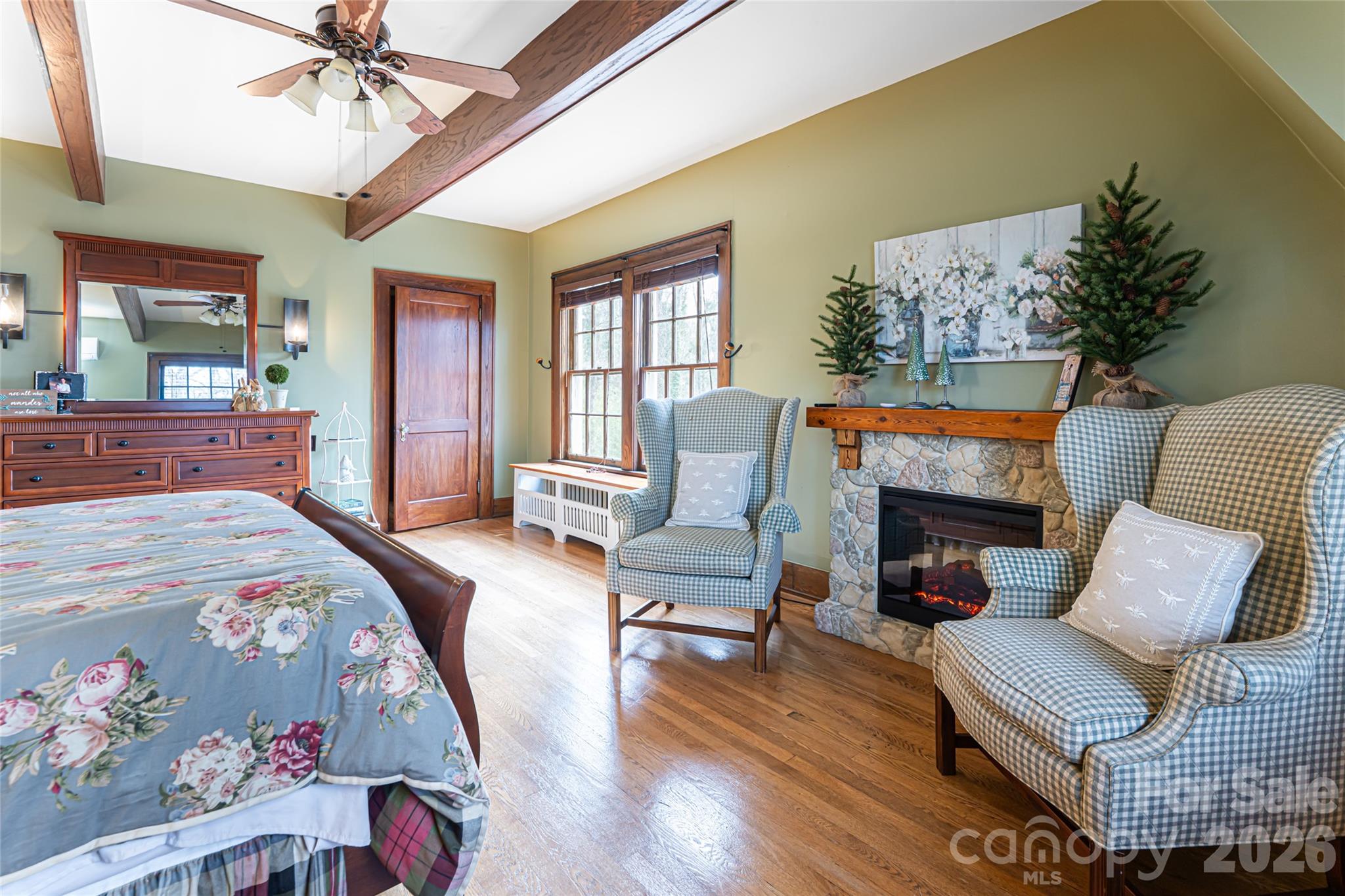 147 Preservation Way Waynesville, NC 28786 - Photo 29 of 48 a bedroom with furniture and a fireplace