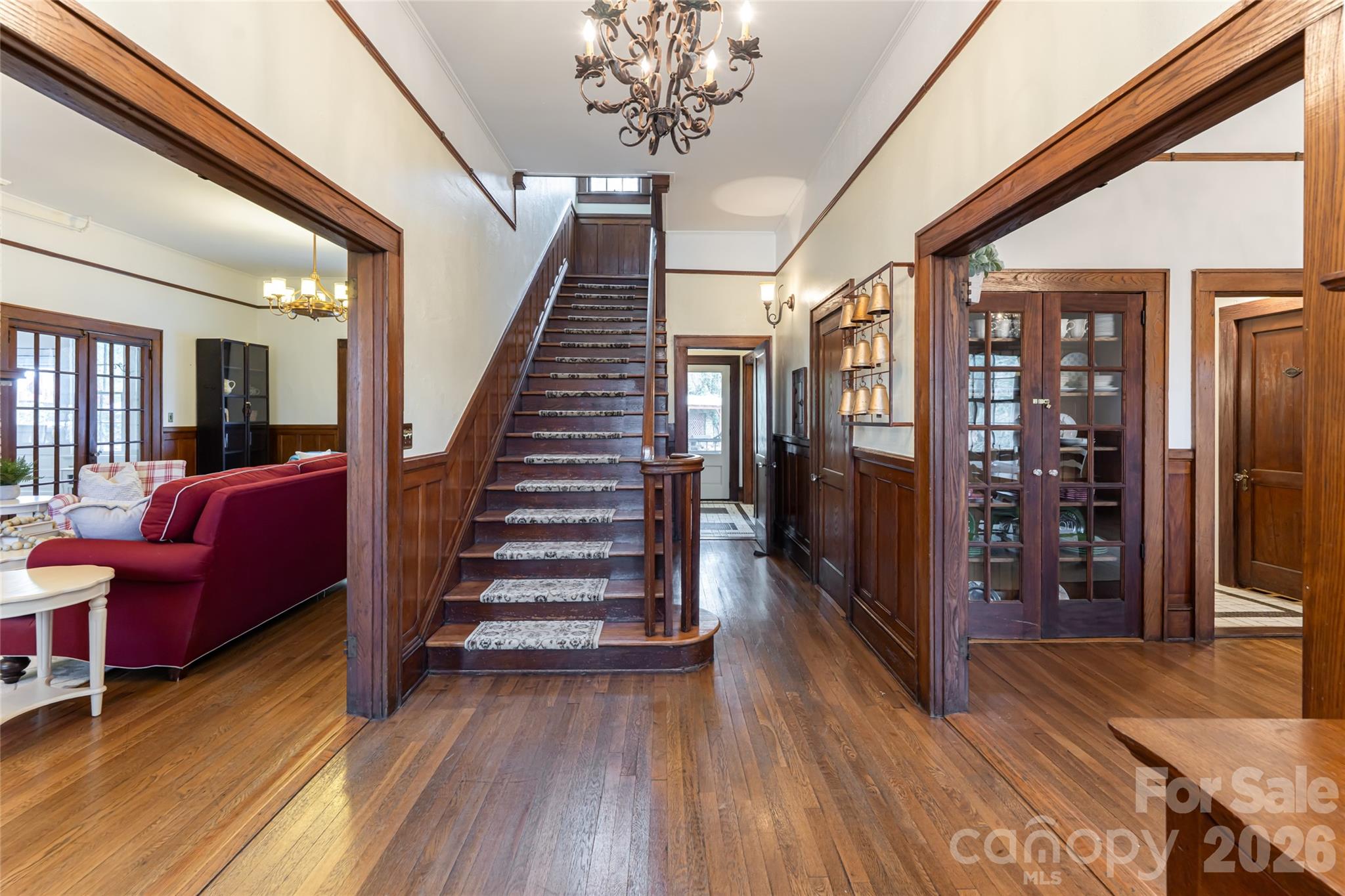 147 Preservation Way Waynesville, NC 28786 - Photo 3 of 48 a view of a livingroom with furniture stairs and wooden floor