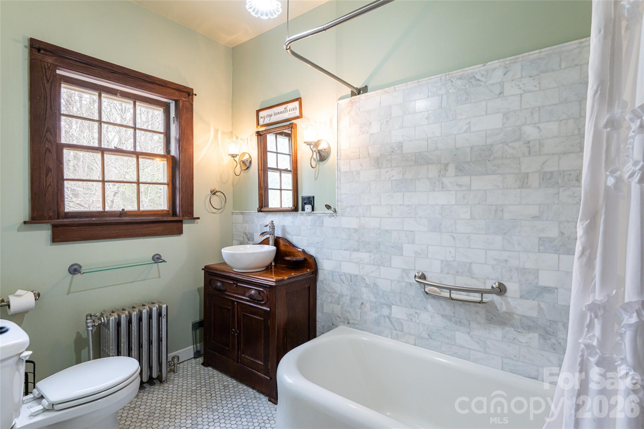 147 Preservation Way Waynesville, NC 28786 - Photo 32 of 48 a bath room with a toilet and a bath tub
