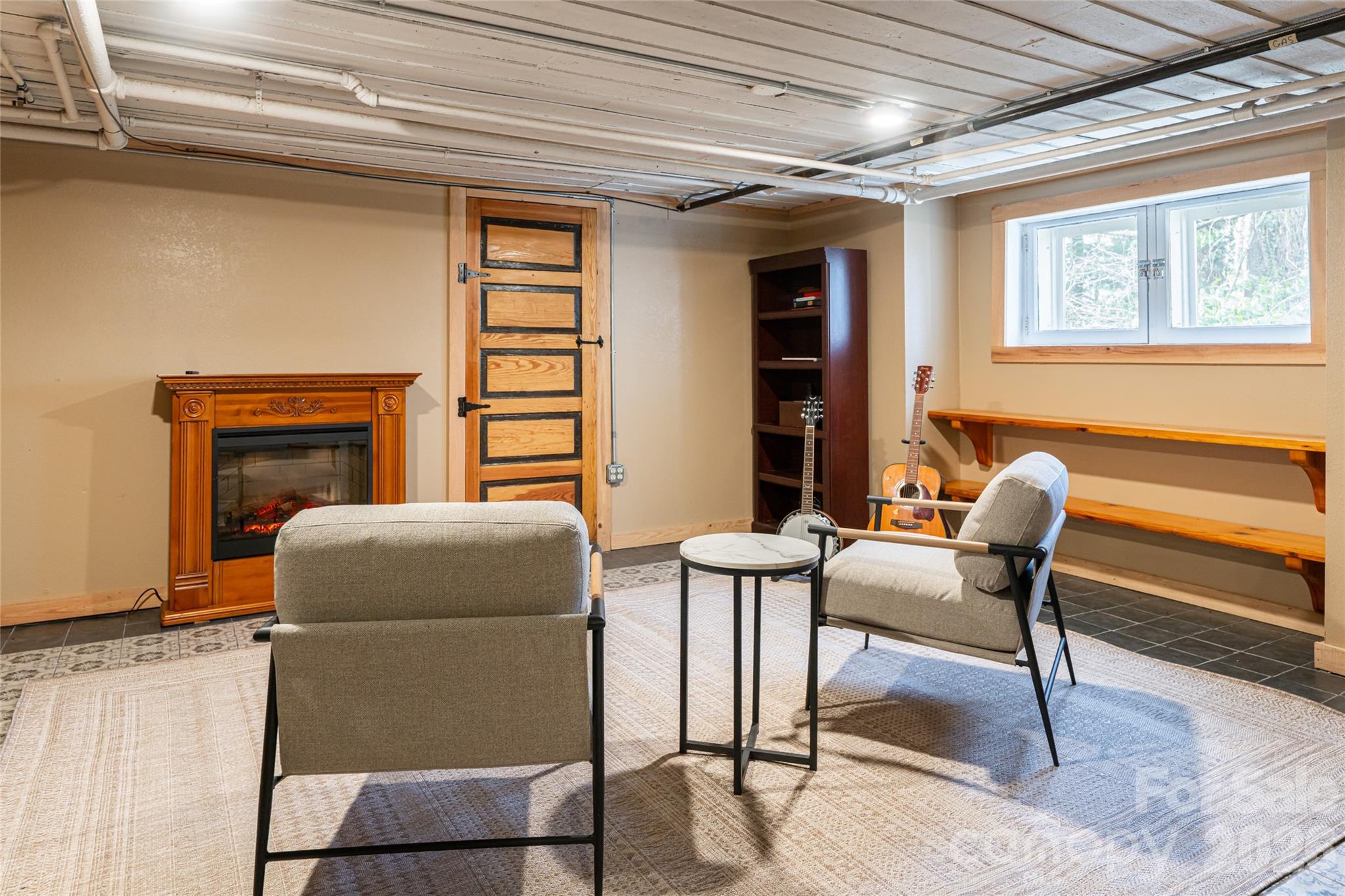 147 Preservation Way Waynesville, NC 28786 - Photo 39 of 48 a living room with furniture and a fireplace