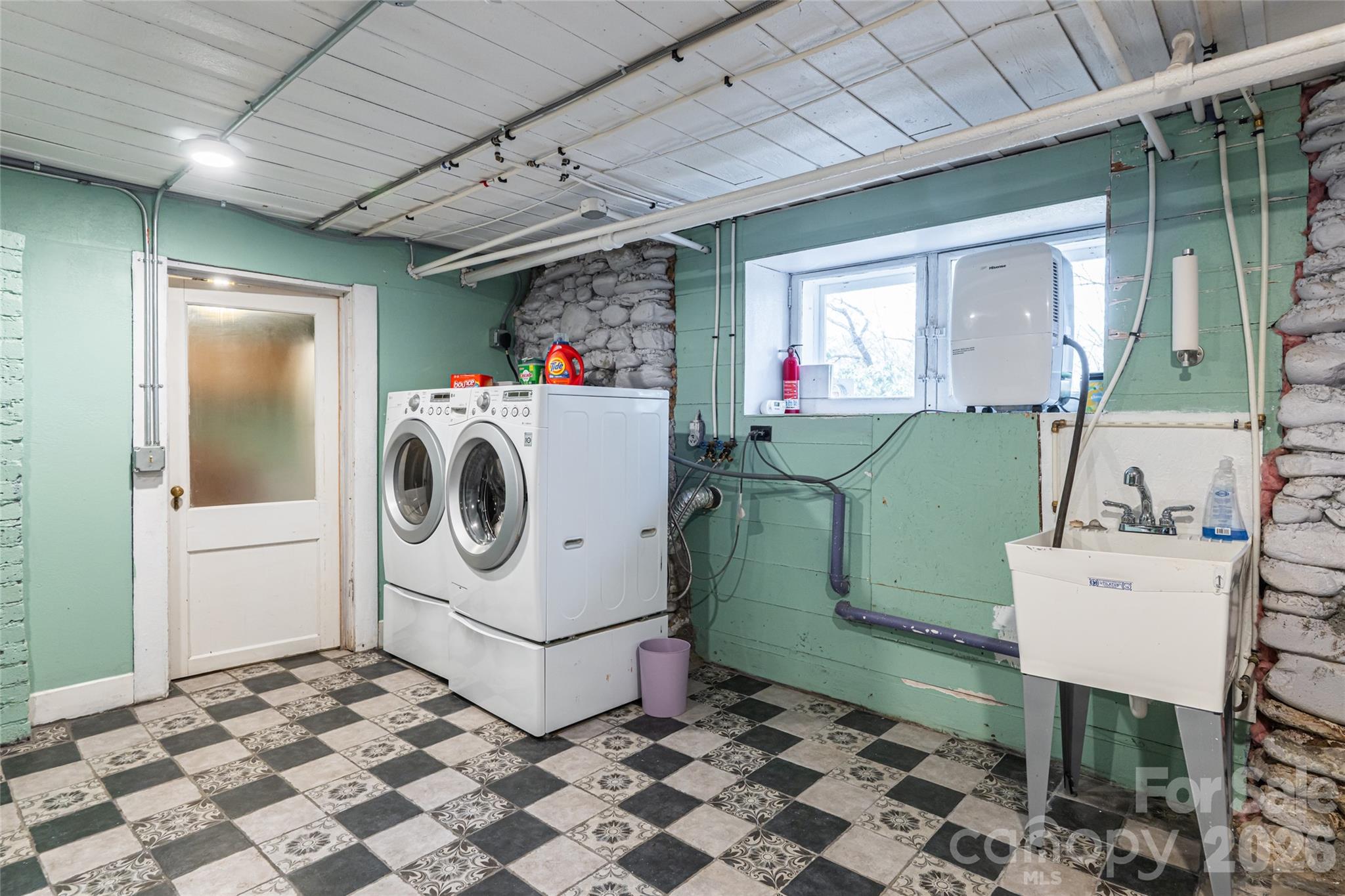 147 Preservation Way Waynesville, NC 28786 - Photo 40 of 48 a utility room with a washer and dryer