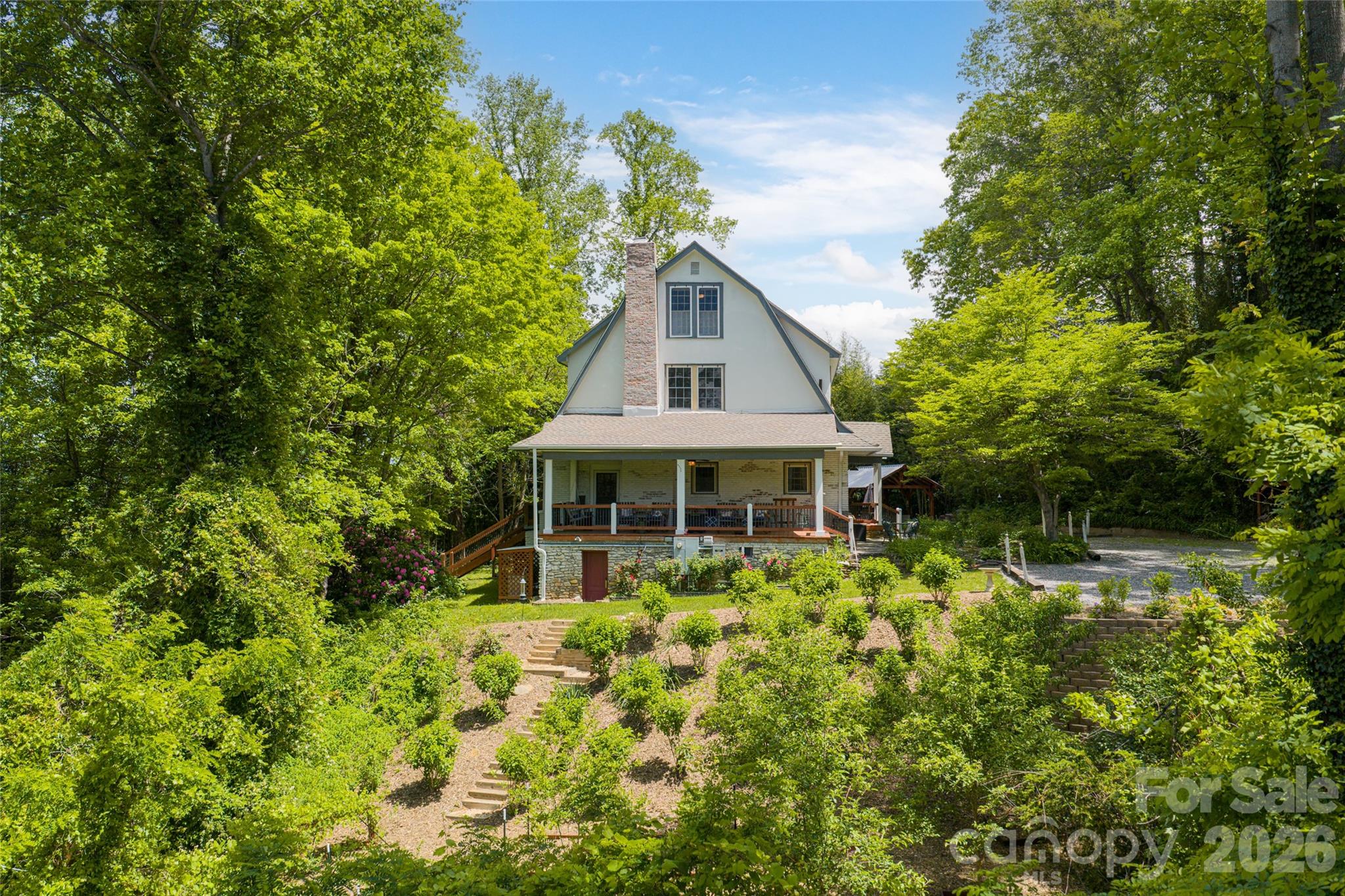 147 Preservation Way Waynesville, NC 28786 - Photo 47 of 48 a front view of a house with a yard