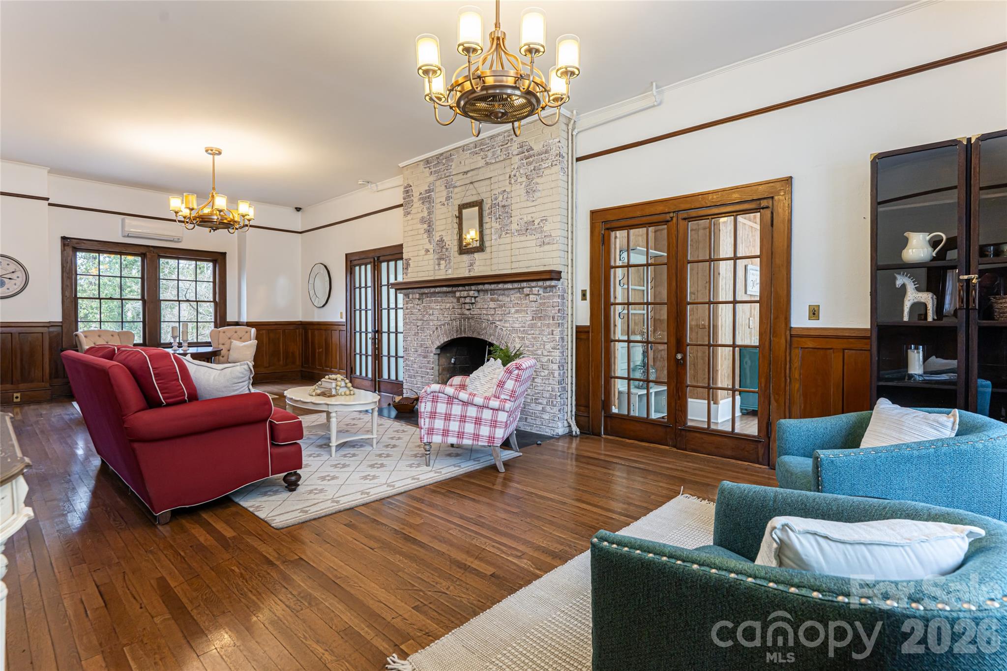 147 Preservation Way Waynesville, NC 28786 - Photo 7 of 48 a living room with furniture or couch and a fireplace