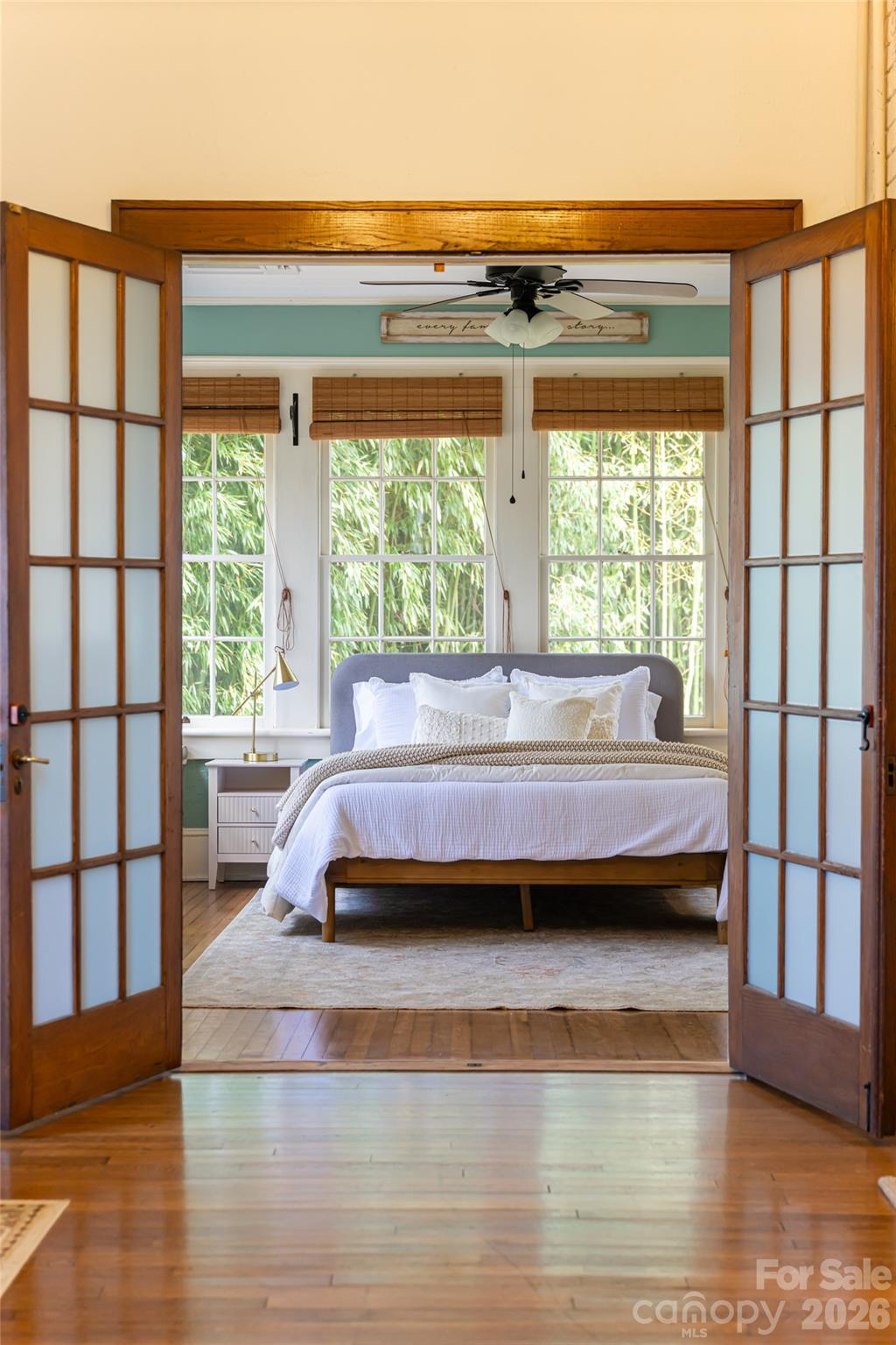 147 Preservation Way Waynesville, NC 28786 - Photo 8 of 48 a bedroom with a bed and a large window with outer view