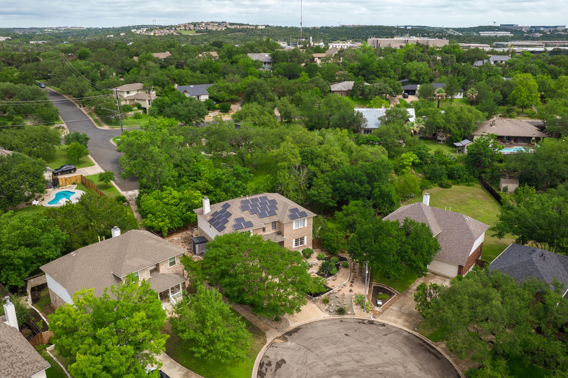7000 Bending Oak Road Austin, TX 78749 - Photo 3 of 39 an aerial view of a house with a yard