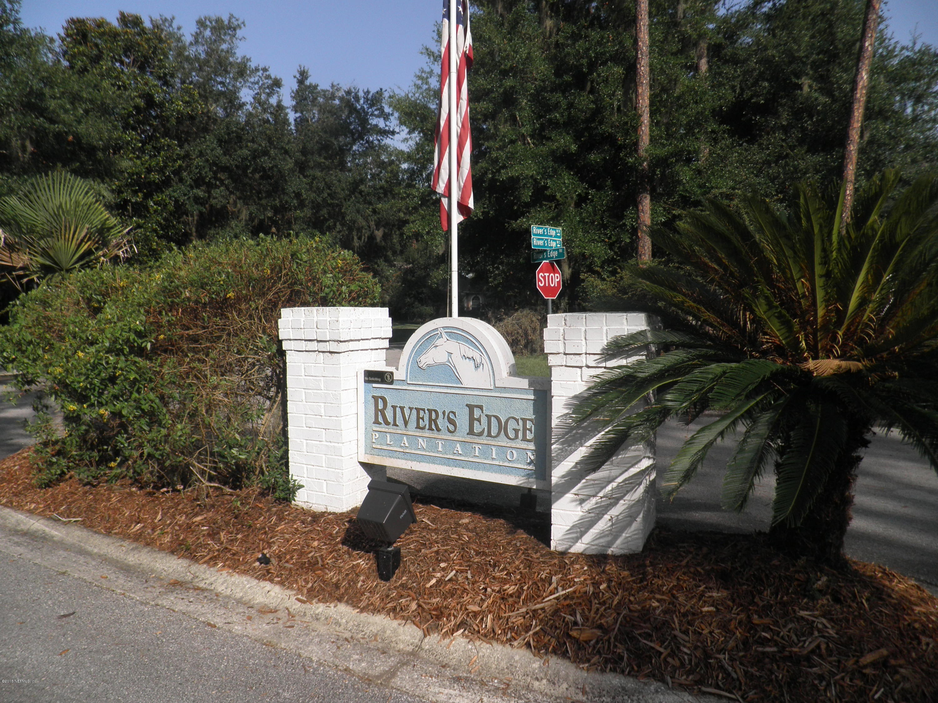 200 River's Edge Road South St. Augustine, FL 32092 - Photo 8 of 11 a view of a bench in a garden