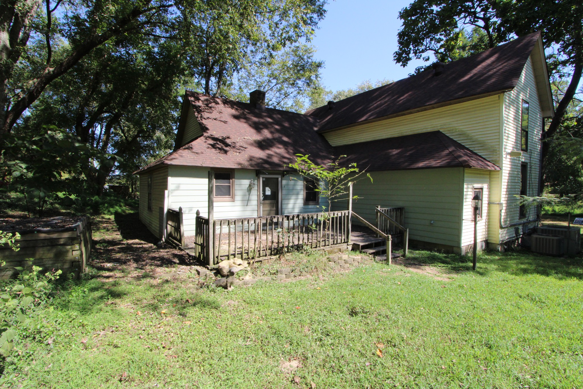 3182 Dodson Gap Road Culleoka, TN 38451 - Photo 15 of 15 a view of a house with backyard and sitting area