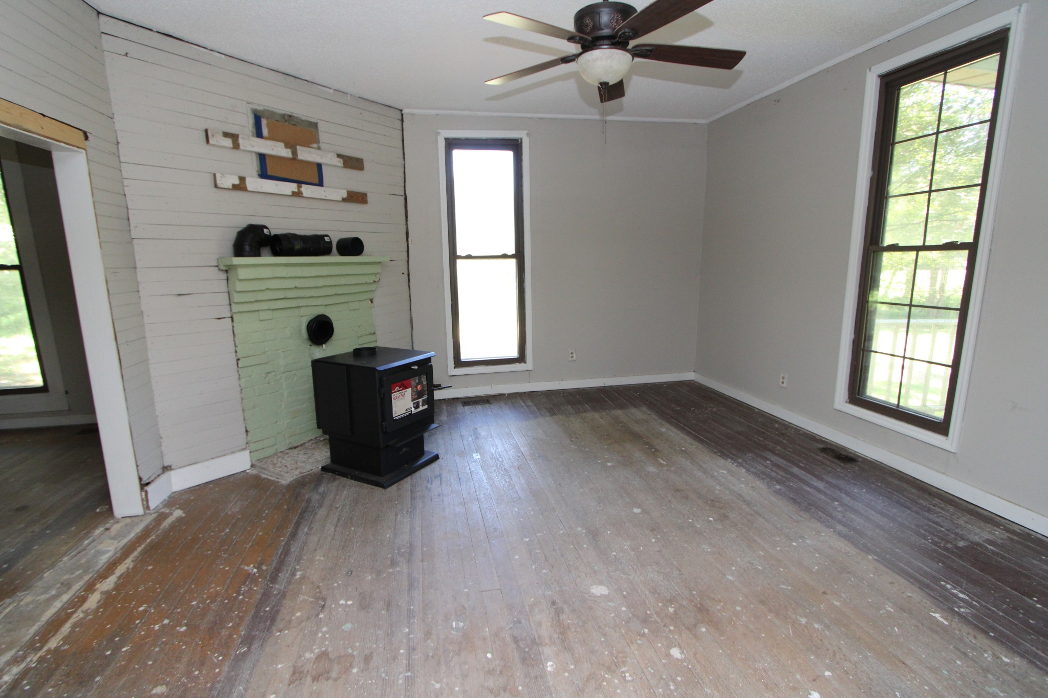 3182 Dodson Gap Road Culleoka, TN 38451 - Photo 4 of 15 wooden floor in an empty room with a window