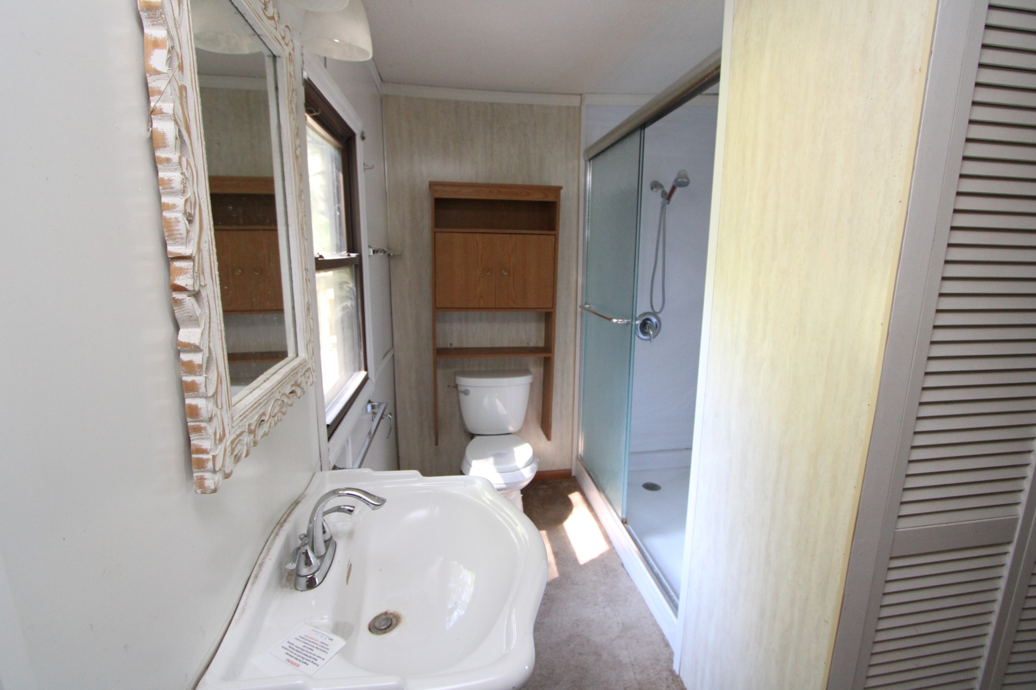 3182 Dodson Gap Road Culleoka, TN 38451 - Photo 7 of 15 a bathroom with a sink and a toilet