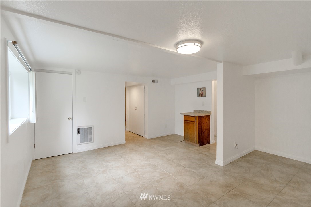 3726 199th Street Southeast Bothell, WA 98012 - Photo 16 of 18 an empty room with closet and windows