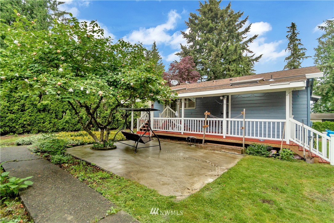 3726 199th Street Southeast Bothell, WA 98012 - Photo 17 of 18 a view of a house with backyard and sitting area