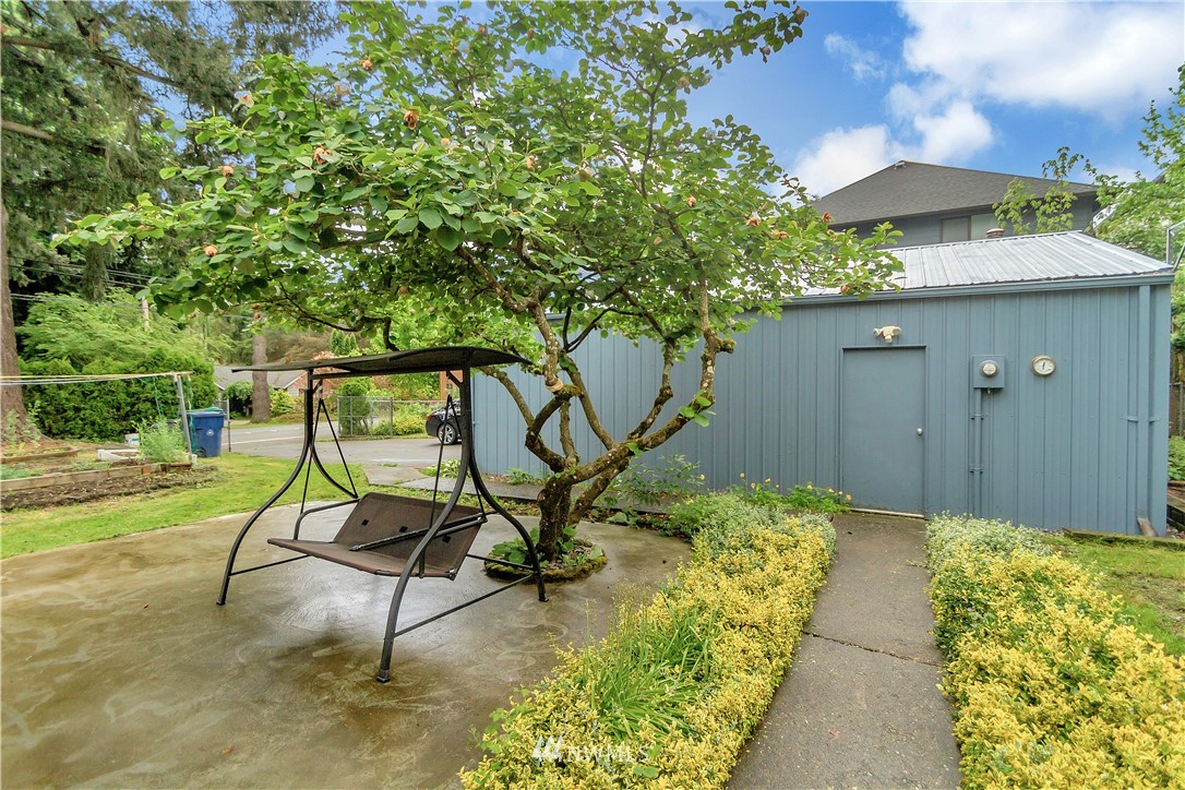 3726 199th Street Southeast Bothell, WA 98012 - Photo 18 of 18 a backyard of a house with table and chairs