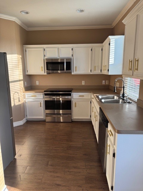 6815 Independence Boulevard Baytown, TX 77521 - Photo 8 of 24 a kitchen with stainless steel appliances granite countertop a stove a sink and a microwave
