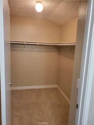 a view of small space with racks on the wall