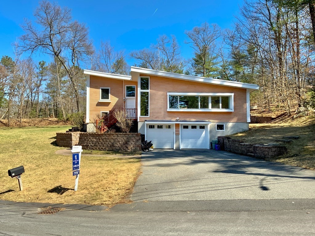 31 Patterson Road Lexington, MA 02421 - Photo 1 of 1 a front view of a house with garden