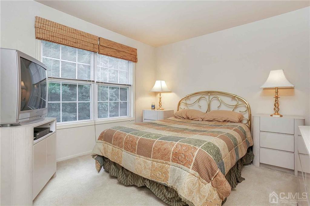50 Stratton Road Old Bridge, NJ 07747 - Photo 8 of 15 a bedroom with a bed and a window
