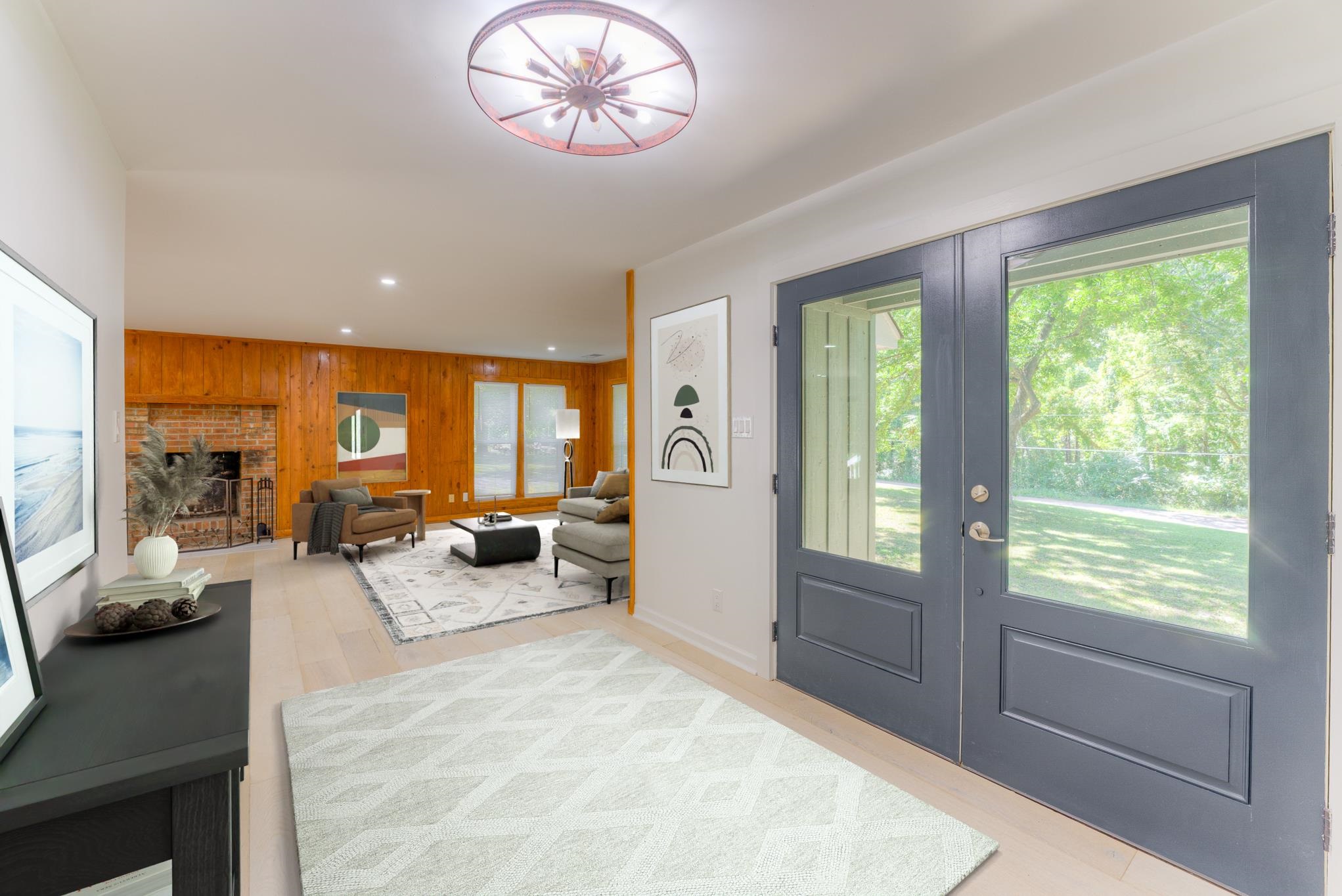 6224 Benjestown Road Memphis, TN 38127 - Photo 2 of 36 a large living room with furniture and a large window