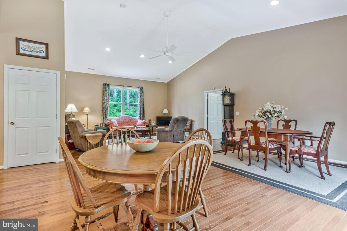 1955 Wilson Road Huntingtown, MD 20639 - Photo 15 of 45 a view of a dining room with furniture and wooden floor