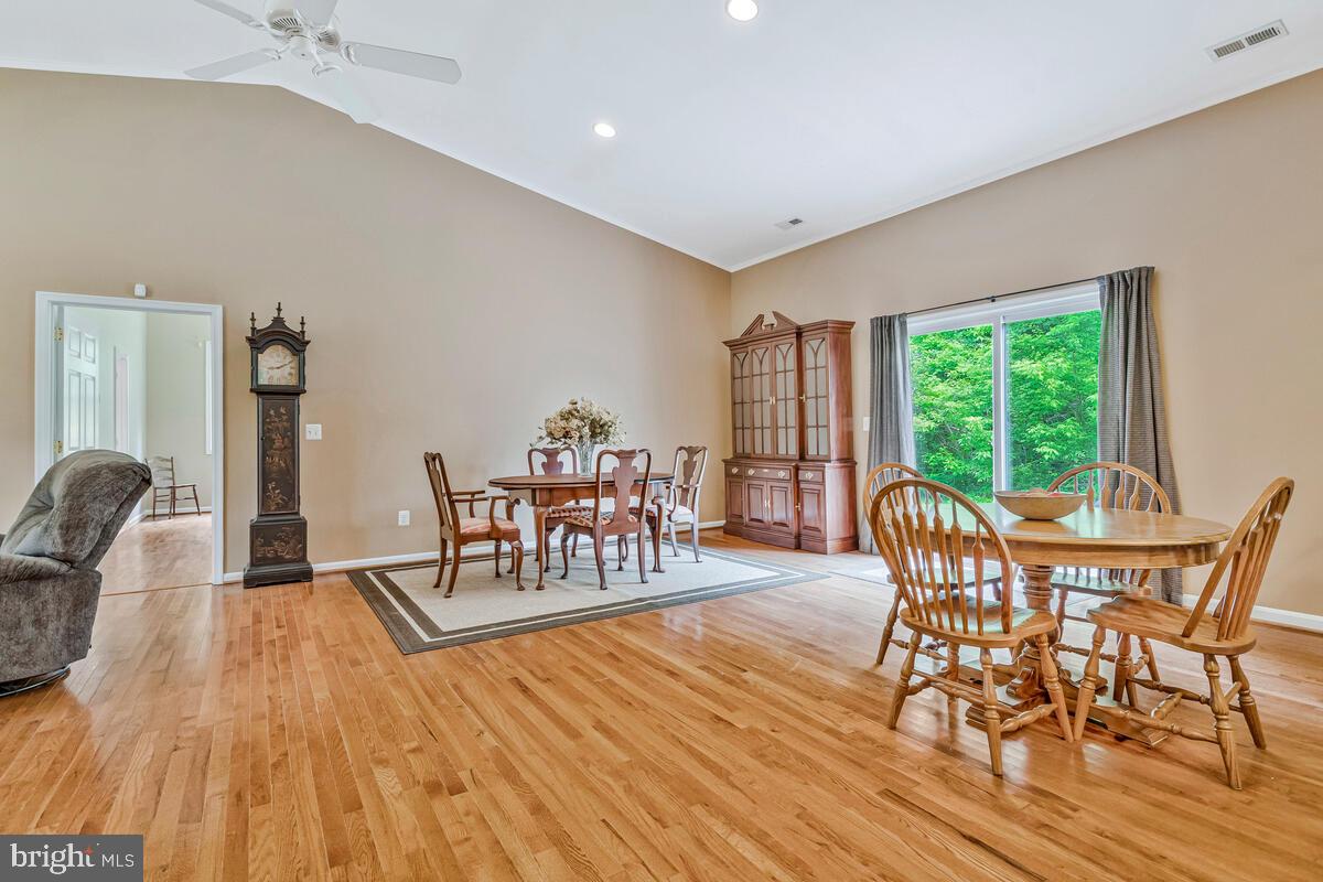 1955 Wilson Road Huntingtown, MD 20639 - Photo 18 of 45 a dining room with furniture window and wooden floor