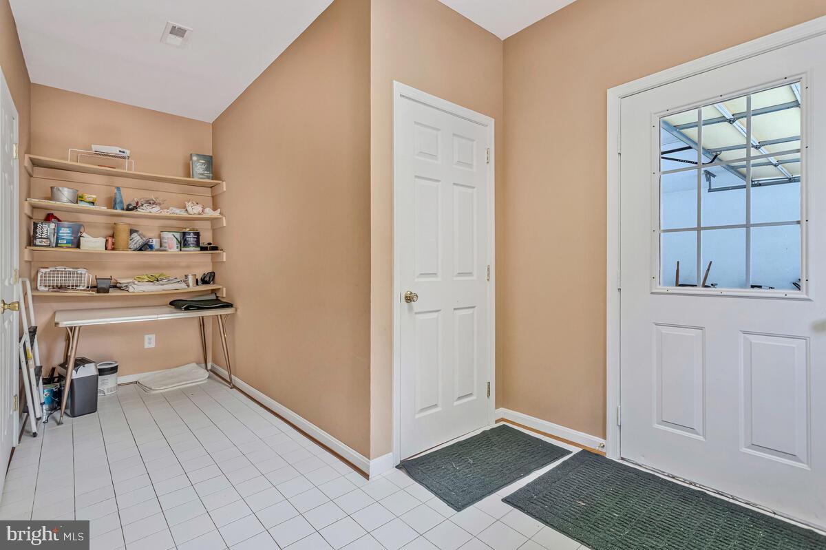 1955 Wilson Road Huntingtown, MD 20639 - Photo 32 of 45 a view of kitchen with cabinets and window
