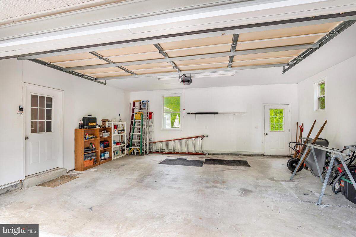 1955 Wilson Road Huntingtown, MD 20639 - Photo 34 of 45 a view of a room with gym equipment