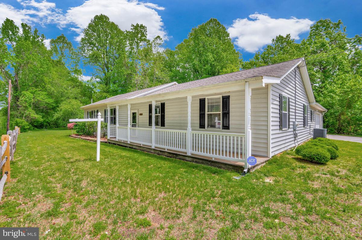1955 Wilson Road Huntingtown, MD 20639 - Photo 38 of 45 a backyard of a house with lots of green space