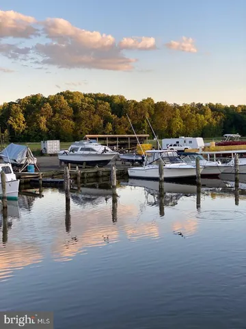 a view of a lake with a big yard