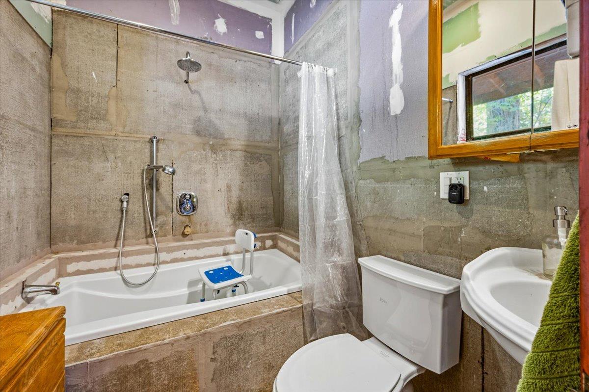 19643 Sages Road Nevada City, CA 95959 - Photo 13 of 39 a bathroom with a sink toilet and shower