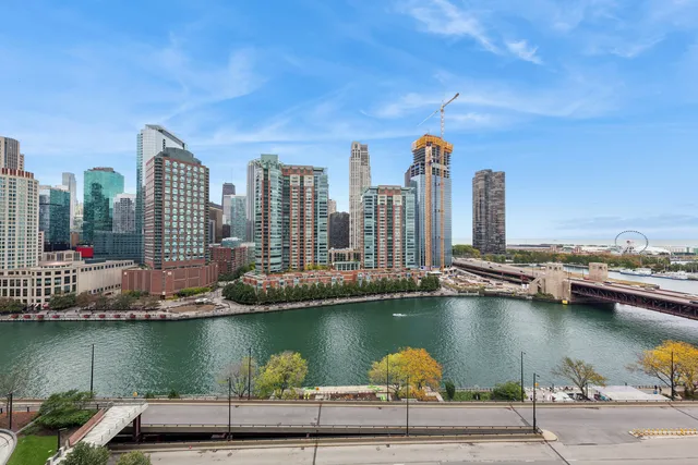 a view of a city with tall buildings