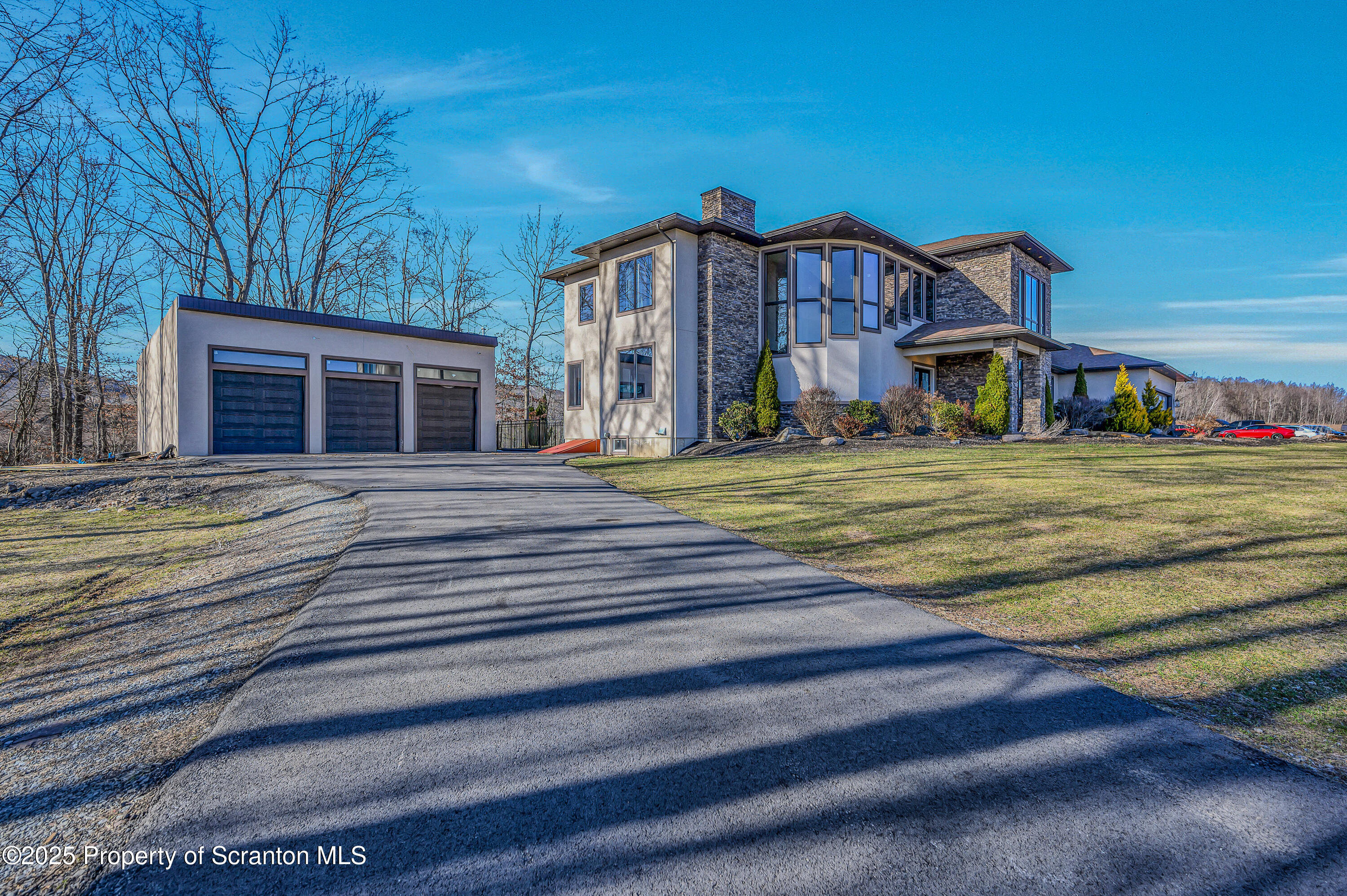 815 Oak Street Archbald, PA 18403 - Photo 11 of 85 a front view of a house with a yard