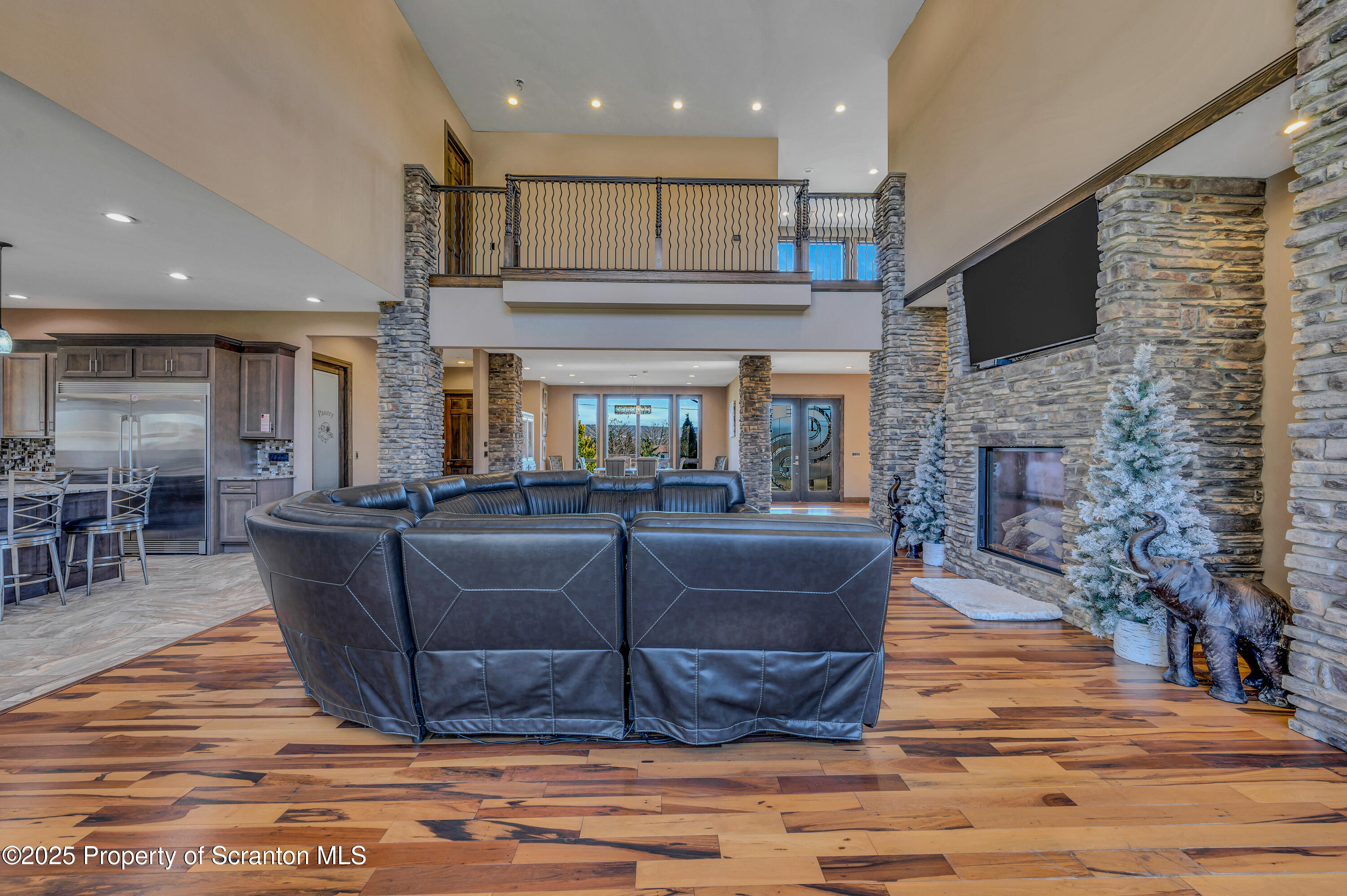 815 Oak Street Archbald, PA 18403 - Photo 31 of 85 a living room with furniture a flat screen tv and a fireplace