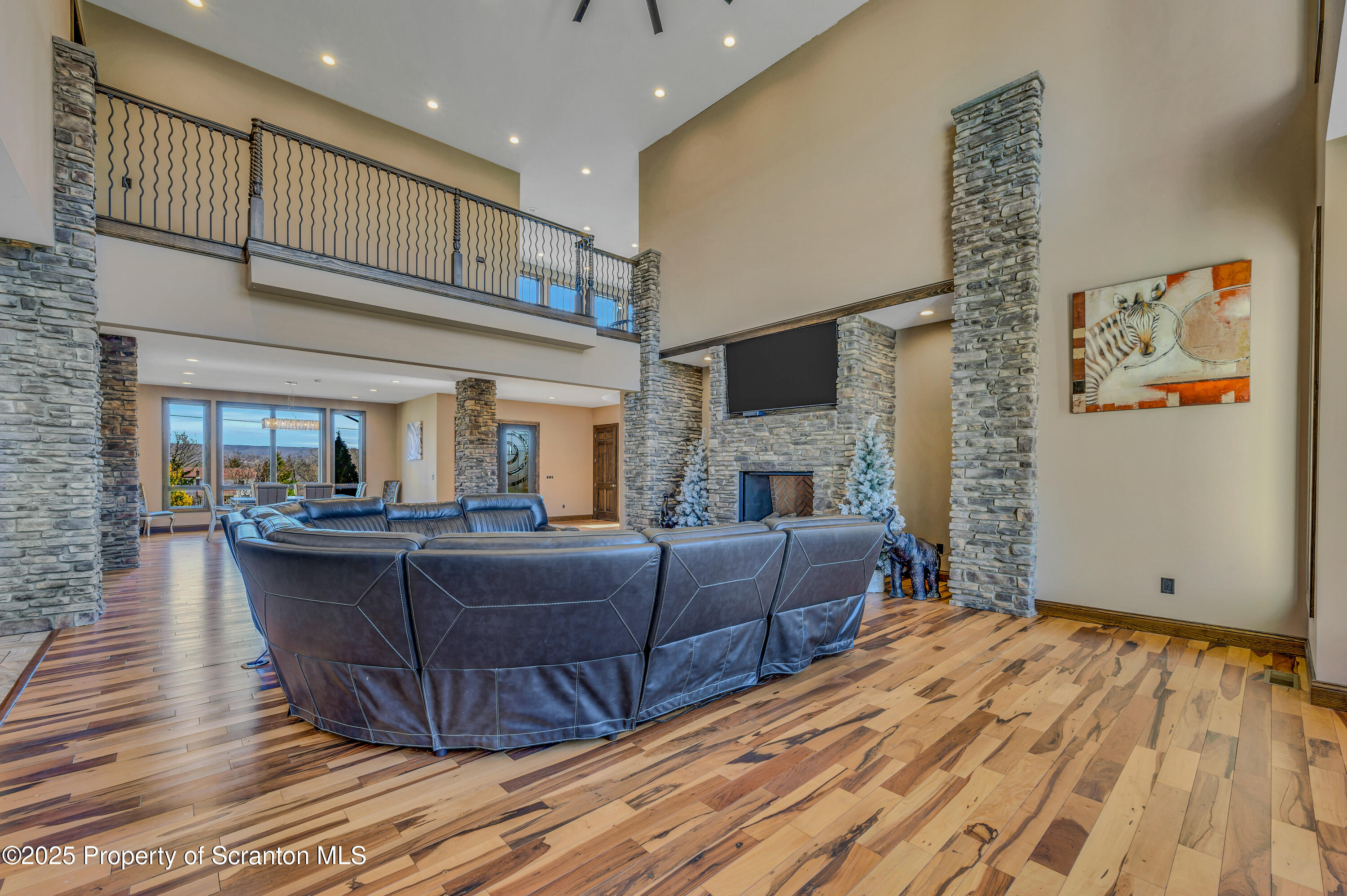 815 Oak Street Archbald, PA 18403 - Photo 32 of 85 a living room with fireplace furniture and a wooden floor