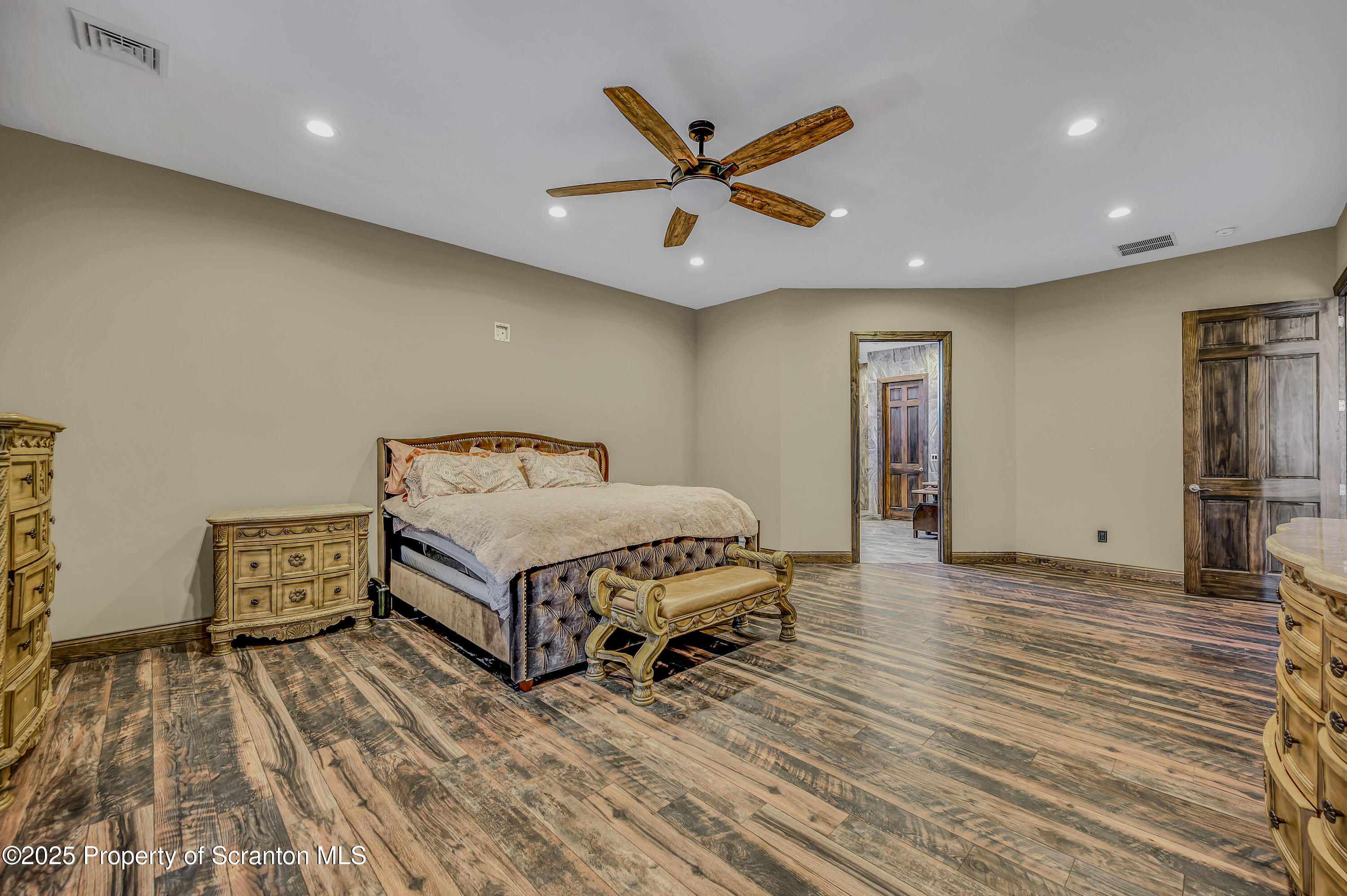 815 Oak Street Archbald, PA 18403 - Photo 33 of 85 a bedroom with a bed and a ceiling fan