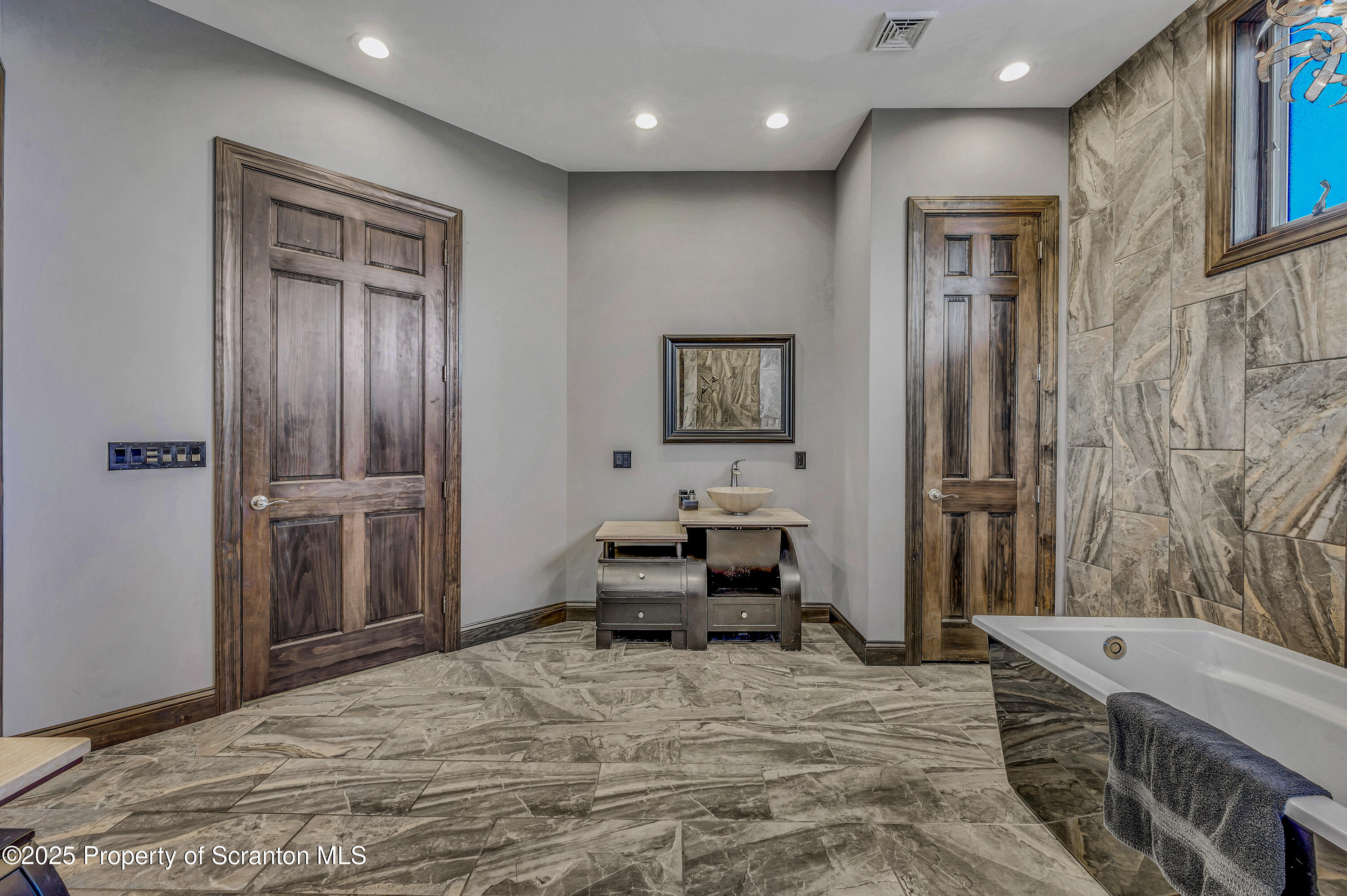 815 Oak Street Archbald, PA 18403 - Photo 39 of 85 a bedroom with a bed and a view of bathroom