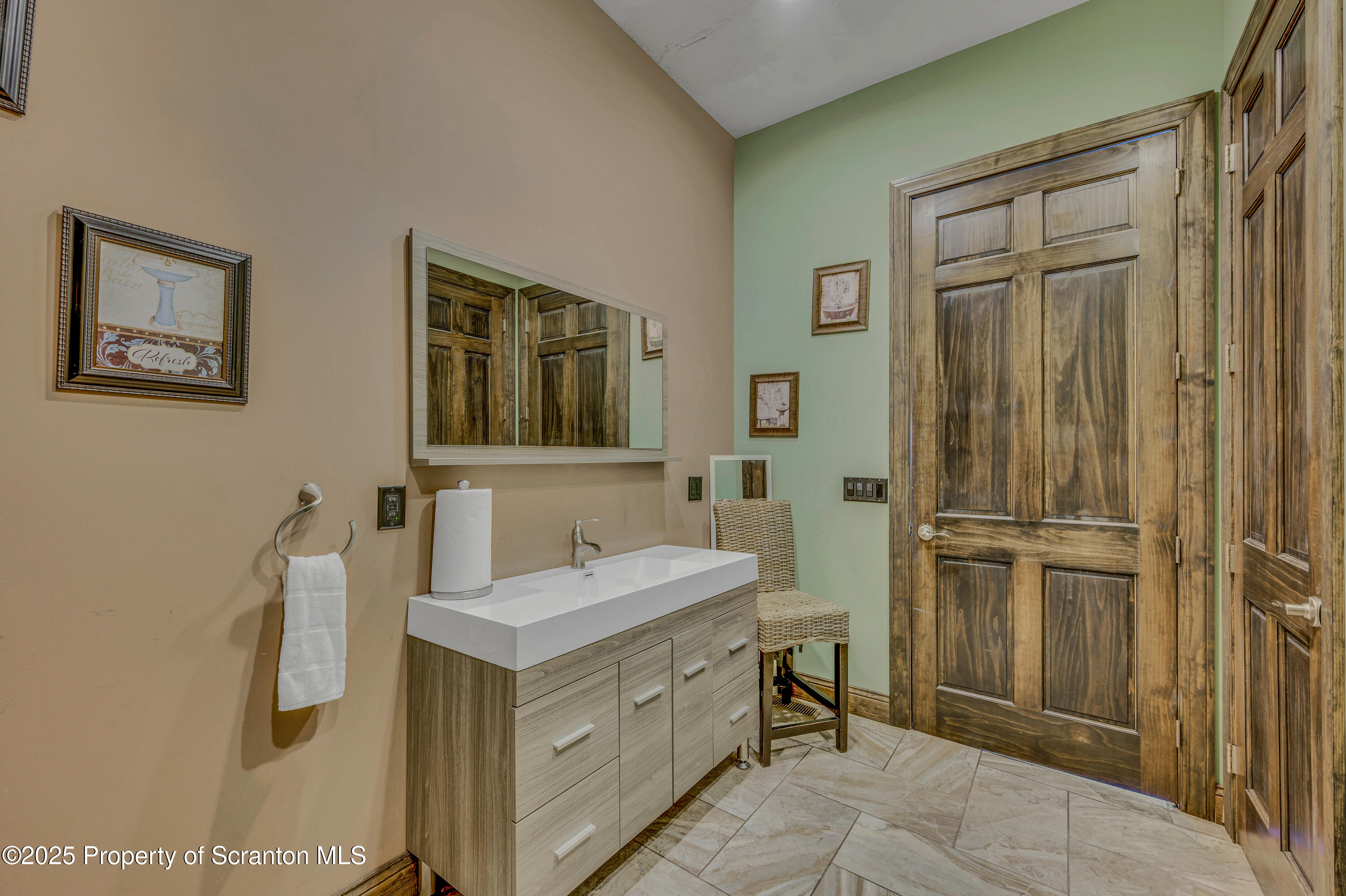 815 Oak Street Archbald, PA 18403 - Photo 52 of 85 a bathroom with a sink vanity and mirror