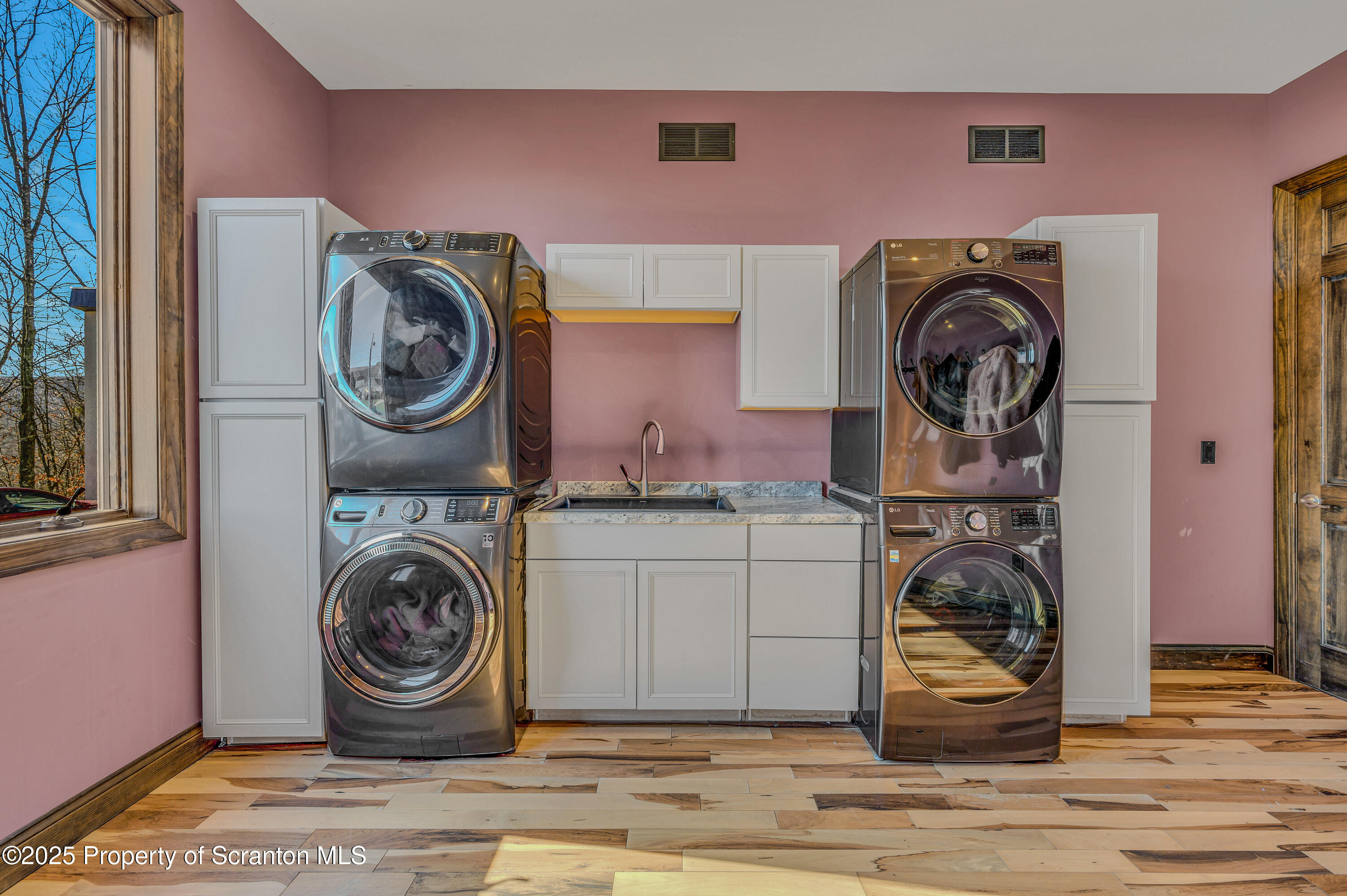 815 Oak Street Archbald, PA 18403 - Photo 60 of 85 a view of a storage and utility room with washer and dryer