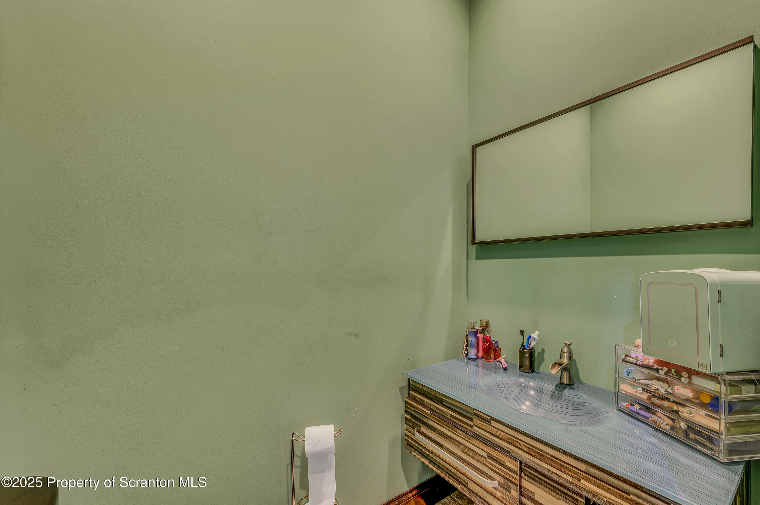815 Oak Street Archbald, PA 18403 - Photo 62 of 85 a room with a wooden floor and a sink
